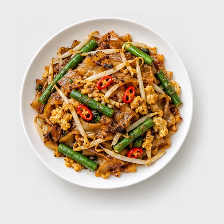 Nouilles sautées de Singapour façon char kway teow végétarien